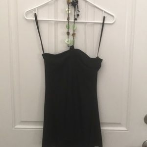 Sleeveless black top with beaded tie for neck